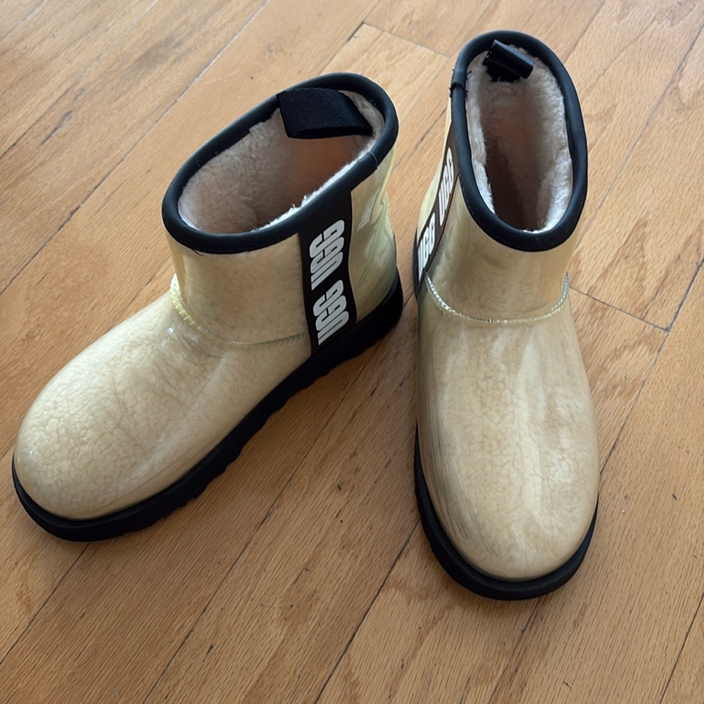 UGG Cream Shearling Boots with Black Accents